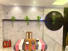 Aman Riverside Hotel
