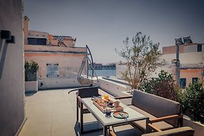 NINEMIAN SUITES SYROS