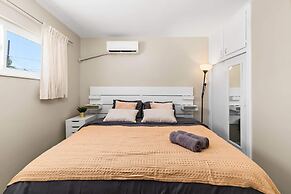 Modern Retreat With Spacious Yard & Cozy Interiors