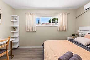 Modern Retreat With Spacious Yard & Cozy Interiors