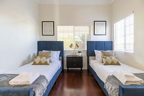 Elegant Retreat Modern Comforts, Prime Location