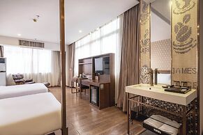 Xingyi Chain Hotel Jiangxia Metro Station