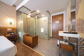 Xingyi Chain Hotel Jiangxia Metro Station