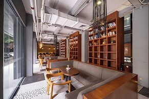 Xingyi Chain Hotel Jiangxia Metro Station