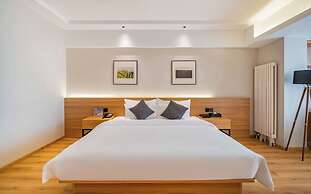 Xingyi Chain Hotel Jiangxia Metro Station