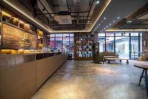 Xingyi Chain Hotel Jiangxia Metro Station