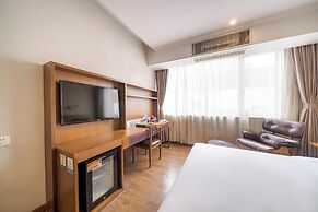 Xingyi Chain Hotel Jiangxia Metro Station