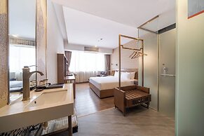 Xingyi Chain Hotel Jiangxia Metro Station