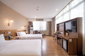 Xingyi Chain Hotel Jiangxia Metro Station