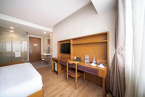 Xingyi Chain Hotel Jiangxia Metro Station