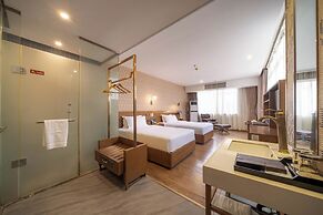 Xingyi Chain Hotel Jiangxia Metro Station