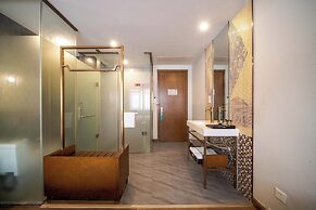 Xingyi Chain Hotel Jiangxia Metro Station