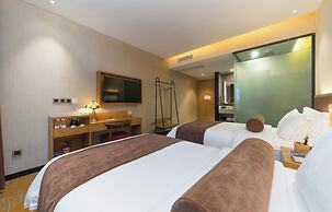 Xingyi Chain Hotel Jiangxia Metro Station