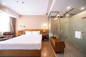 Xingyi Chain Hotel Jiangxia Metro Station