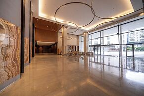 Xingyi Chain Hotel Jiangxia Metro Station