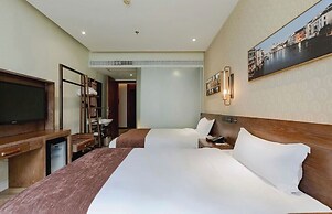 Xingyi Chain Hotel Jiangxia Metro Station