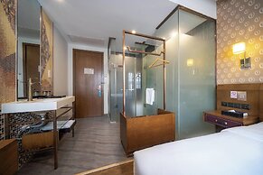 Xingyi Chain Hotel Jiangxia Metro Station