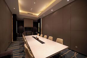 Xingyi Chain Hotel Jiangxia Metro Station