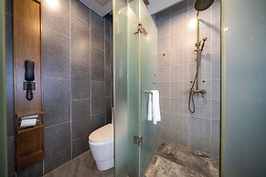 Xingyi Chain Hotel Jiangxia Metro Station