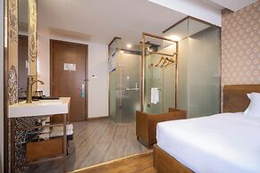 Xingyi Chain Hotel Jiangxia Metro Station