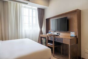 Xingyi Chain Hotel Jiangxia Metro Station