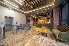 Xingyi Chain Hotel Jiangxia Metro Station