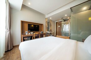 Xingyi Chain Hotel Jiangxia Metro Station