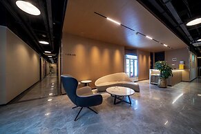 Xingyi Chain Hotel Jiangxia Metro Station