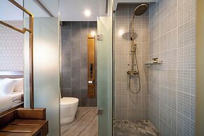 Xingyi Chain Hotel Jiangxia Metro Station