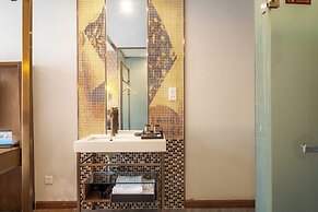 Xingyi Chain Hotel Jiangxia Metro Station