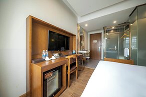 Xingyi Chain Hotel Jiangxia Metro Station