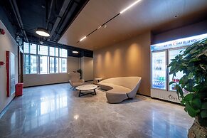 Xingyi Chain Hotel Jiangxia Metro Station