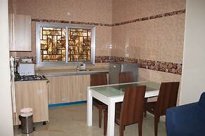 Akkwa Suites Officials