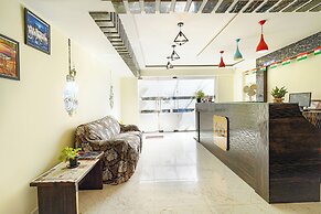 Fabhotel Royal Wood Premier