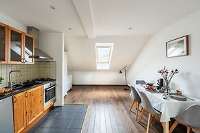 Charming Prague Apartment in Vršovice With Roof Terrace