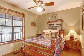 Deck & Fire Pit: Waterfront Cabin in Greers Ferry!