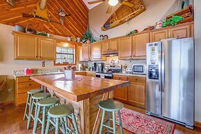 Deck & Fire Pit: Waterfront Cabin in Greers Ferry!