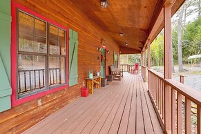 Deck & Fire Pit: Waterfront Cabin in Greers Ferry!