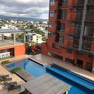 Araneta Cubao No Brown Outs 1BR Furnished Condo With Balcony Free Wifi