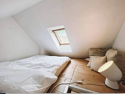 Apartment With Loft and Window Balcony