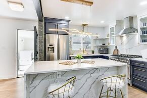 6 Mi to Spectrum Center: Spacious Getaway w/ Deck