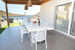 Beachfront Villa Kyma. Your own paradise