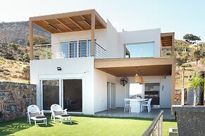 Beachfront Villa Kyma. Your own paradise