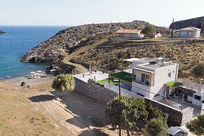 Beachfront Villa Kyma. Your own paradise