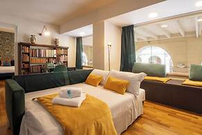 Turin Bed & Books by Wonderful Italy