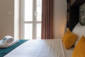 Turin Bed & Books by Wonderful Italy