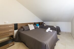 Coll Groc in Grau i Platja