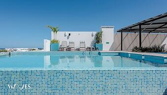 Pool View 1 Br. Steps Away From the Beach