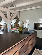 The Apartment Upstairs Canal Penthouse in Copenhagen