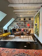 The Apartment Upstairs Canal Penthouse in Copenhagen